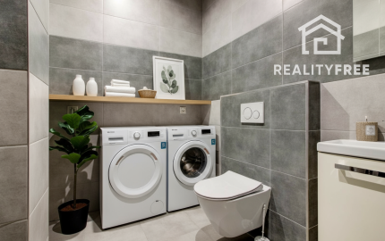 Na predaj 4- izbový rodinný dom s dvojgarážou a záhradným domom v Maslovciach